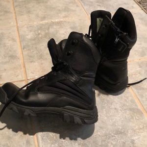 Lightly worn Bates size 7 tactical boots. Not shown1 shoe has minor peeling toe.